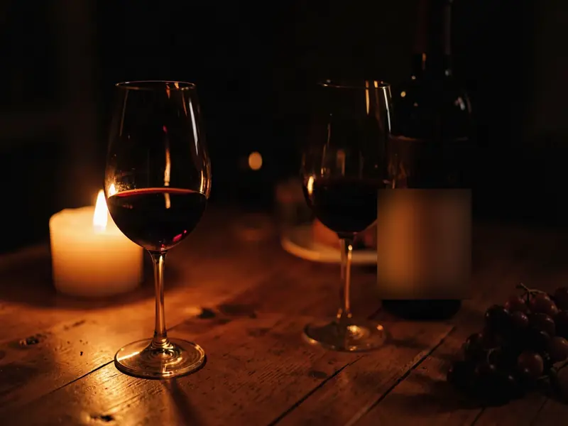 Red wine by candlelight